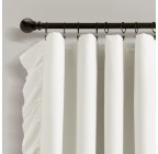 Flowing blackout white curtains